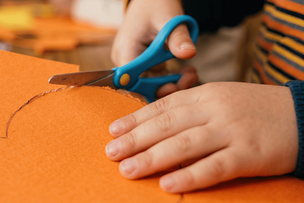 Child cutting paper