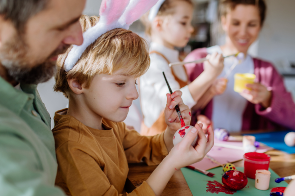 Children painting eggs